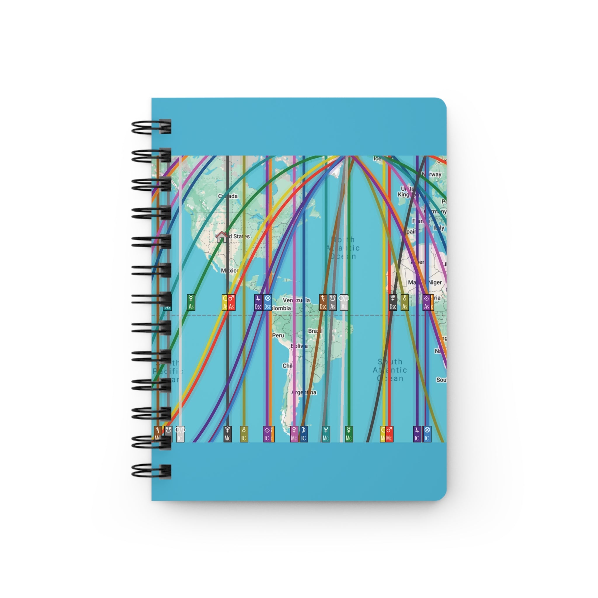 Notebook with colorful astrocartography world map design on a blue background